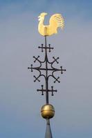 weather vane against sky photo