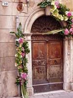 old wooden door with flowers photo