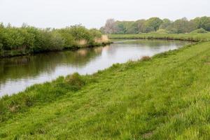 river in the landscape in spring photo