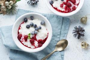 Christmas food, Rice Pudding, top view. Healthy Vegan diet breakfast with coconut milk photo