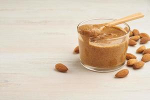 almond butter, raw food paste made from grinding almonds into nut butter photo
