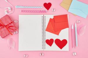 The concept of writing note, letters for Valentine's Day. Notepad page photo