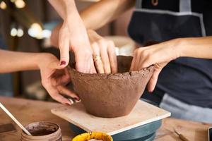 Woman freelance, business, hobby. Woman making ceramic pottery photo