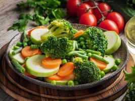 Mix of boiled vegetables, steam vegetables for dietary low-calorie diet. Broccoli photo