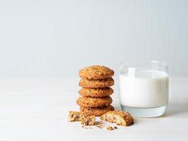 Chocolate oatmeal cookies and milk photo