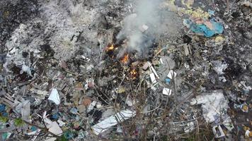Aerial view open burning rubbish cause smoke release created air pollution. video