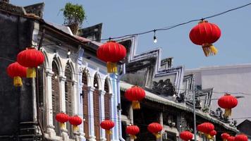 Red oriental lantern with background of Chinese architecture video