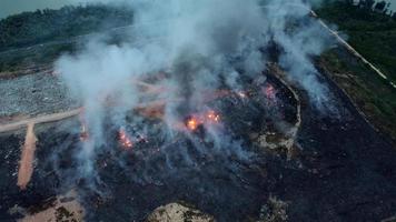 Aerial view fire burning at garbage dump video