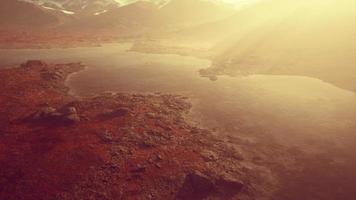 Beautiful view of foggy mountains with a reflection in a lake video