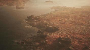 Beautiful view of foggy mountains with a reflection in a lake video
