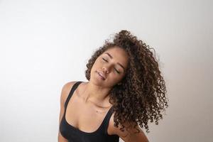 Beauty portrait of african american woman with afro hairstyle and glamour makeup photo