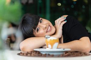 Woman drinking coffee table. Women in cafe. photo