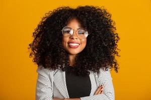Business black woman on a yellow background