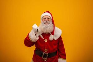 Santa Claus holding a knife. Evil Santa Claus concept. Murder. photo