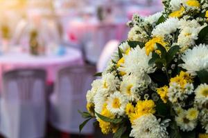 Chrysanthemum bouquet with pink chair.