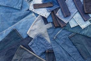 Many pieces of cloth are cut from jeans. photo