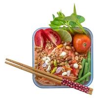 Papaya salad with tomato in a box. photo