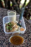 Chicken Rice in Plastic Box. photo