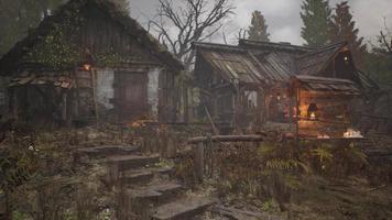 Old abandoned rural wooden house in russian village in summer