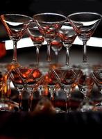 close up of glasses of champagne during a wedding function photo