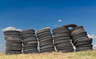 Wheel of old motorcycle tires with skies. photo