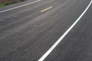 New paved road surface early in the morning. photo