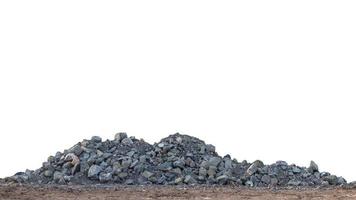 Isolate piles of granite on the ground. photo