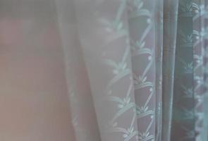 Close-up of white curtain blur soft. photo