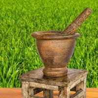 Mortar pestle green rice. photo