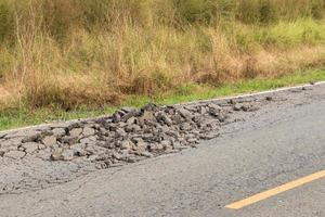 Asphalt road surface crack.