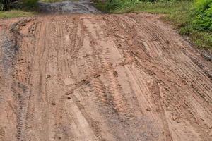 Tracks on a dirt road in the countryside. photo