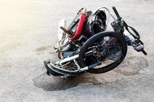 Motorcycles demolished until distorted wheels. photo