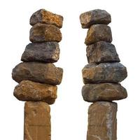 Stones stacked on a pole. photo