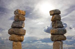 Stacked rocks with sunlight sky. photo