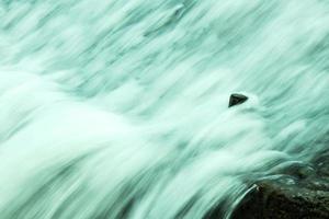 Surface water flowing torrent. photo