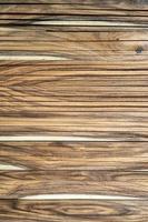 The textured background of the many hardwood panels.