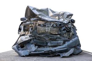 The front close-up isolate of a black-bronze car, which was wrecked to look like wreckage. photo