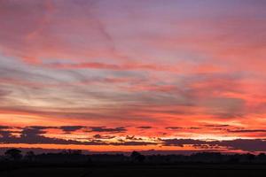 Sky orange and yellow countryside. photo