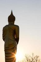 Buddha standing solar alms. photo