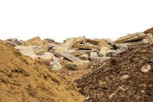 A pile of rubble isolates of concrete blocks obtained from the demolition of an old road. photo