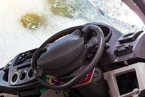 In the car, the steering wheel bent from the accident. photo