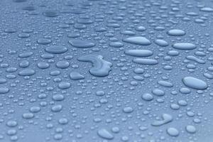 Dew drops on the roof of the car. photo