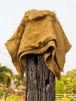 Hemp sack with old pole. photo