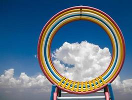 Round steel frame with colorful sky. photo