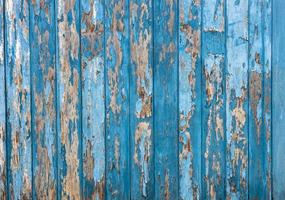 Old blue wood wall background weathered rain till decay. photo