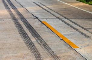 Brake traces of truck wheels on concrete roads. photo