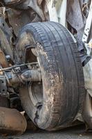 Close-up of the old tires of the car wheels were demolished. photo