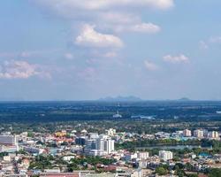 View from above, buildings with mountains and swamps. photo