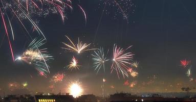 Long time exposure of fireworks over the roofs of vienna photo