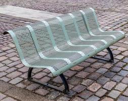 A public empty bench found in northern Europe photo